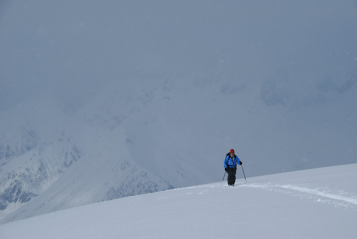 Climbing to Sapphire Col under thickening clouds